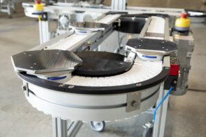 workpiece carrier system on an belt conveyor
